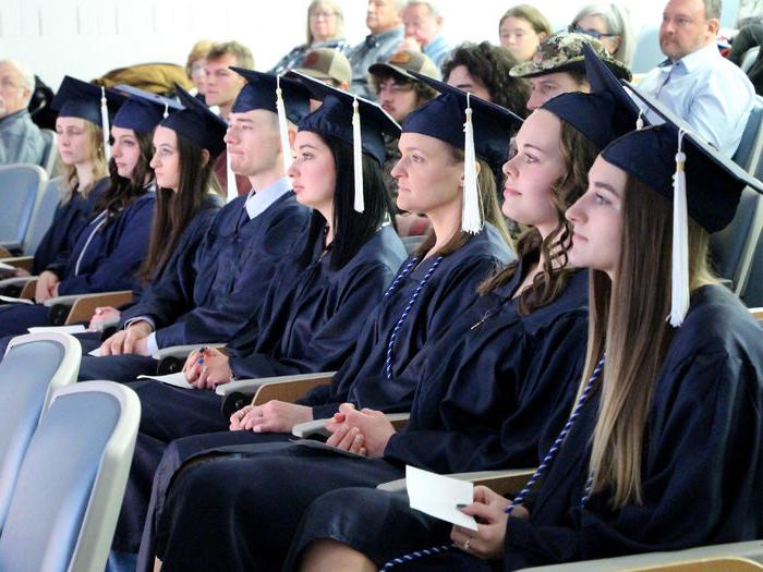 Graduates listen to the speakers during the commencement celebration for the class of fall 2024 at Penn State DuBois.